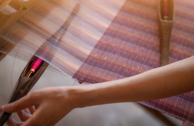 Woman Weaving with a Loom - Weaving Terminology